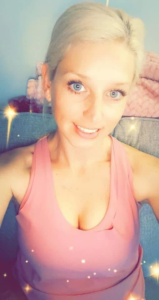 Kristin takes a break from waitressing to flash her nice titties & ass for the camera