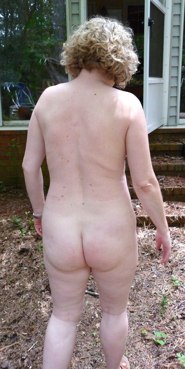 my wife posing naked outside