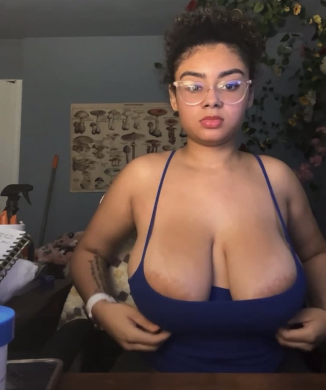 Milk filled teen flashes massive boobs.