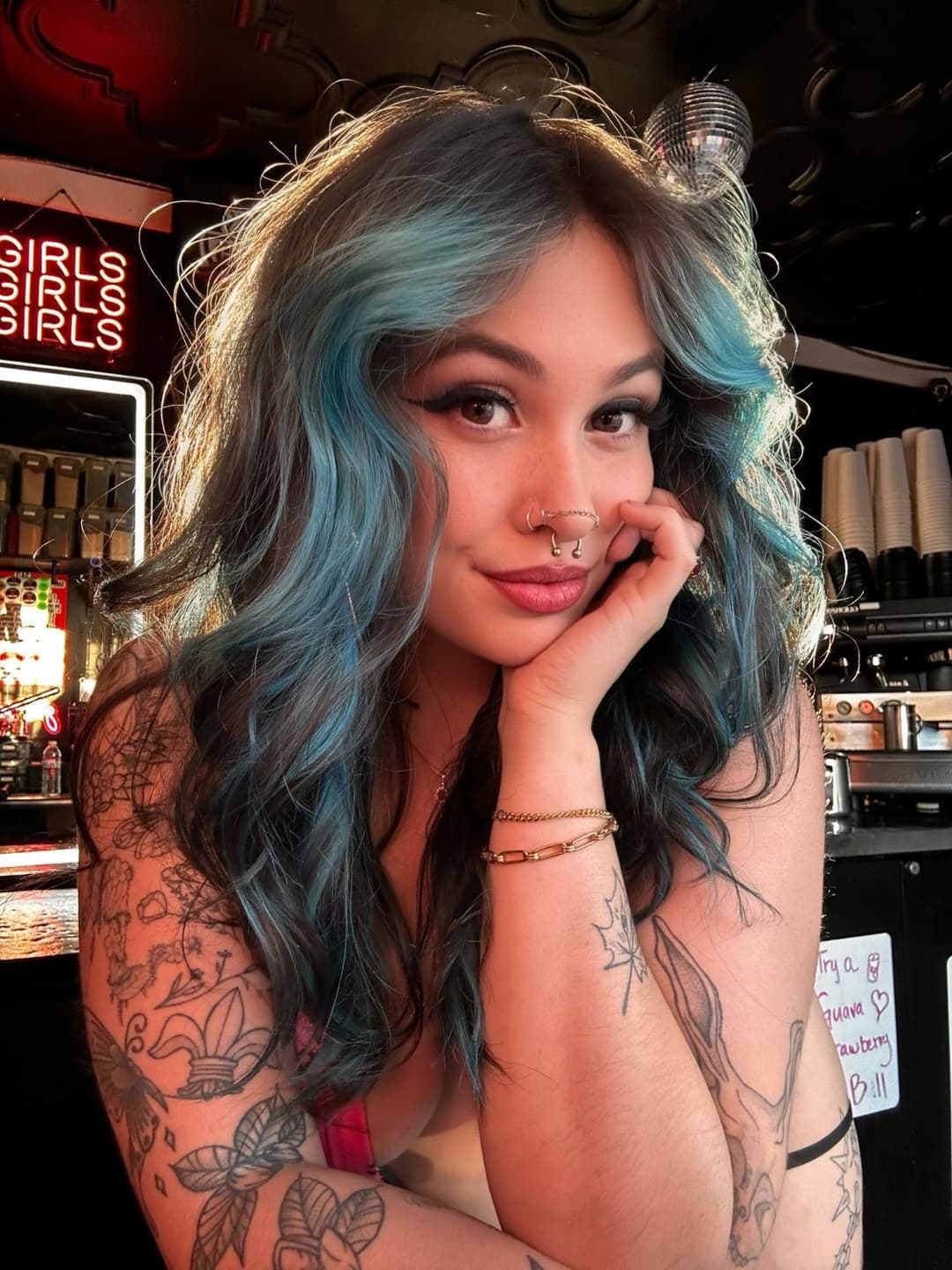 Tattooed Latina barista