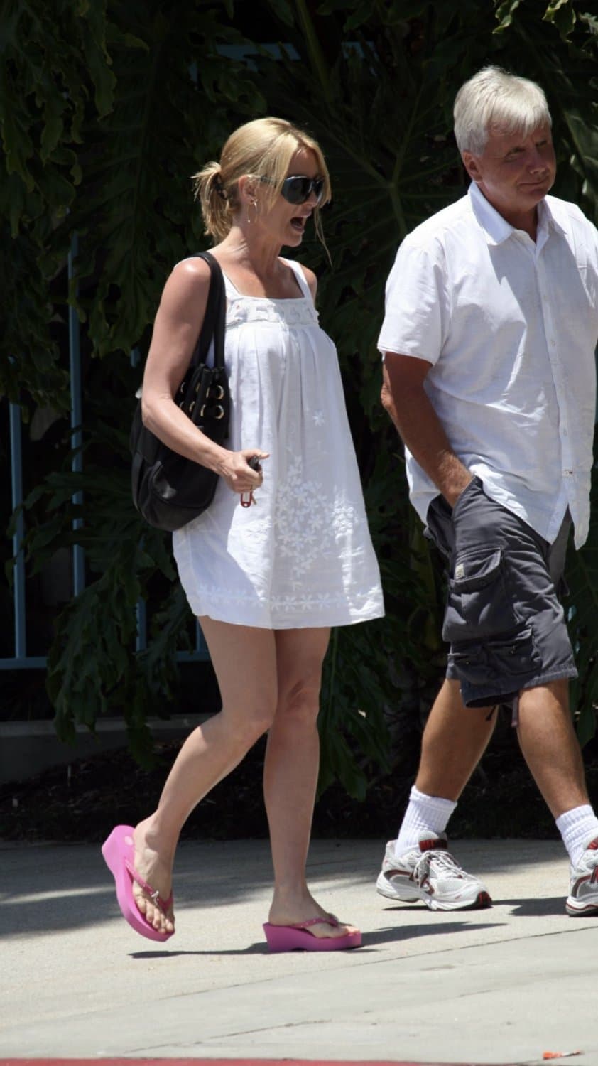 Nicollette Sheridan in platform flip flops