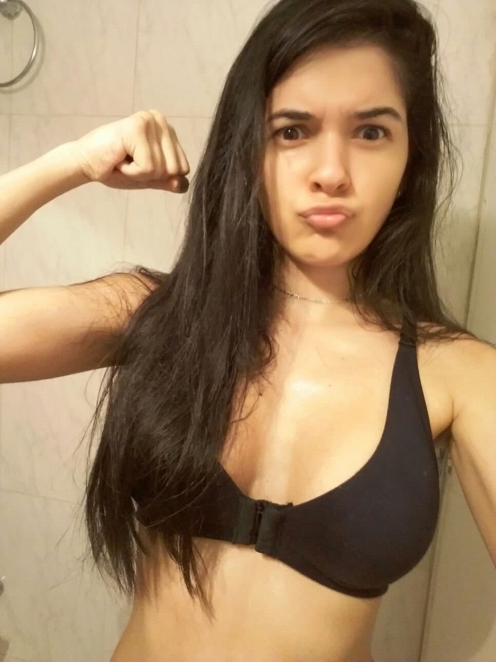 Brunette slut fake tits pretty smile