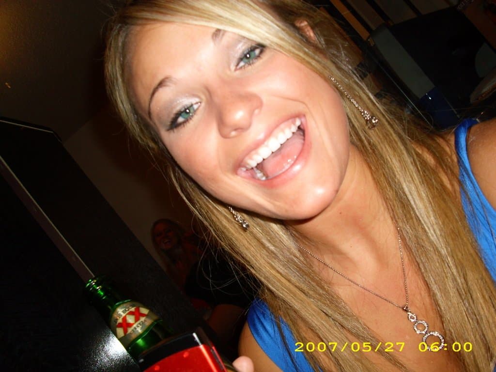 Sorority girls pre-game drink in the dorm room