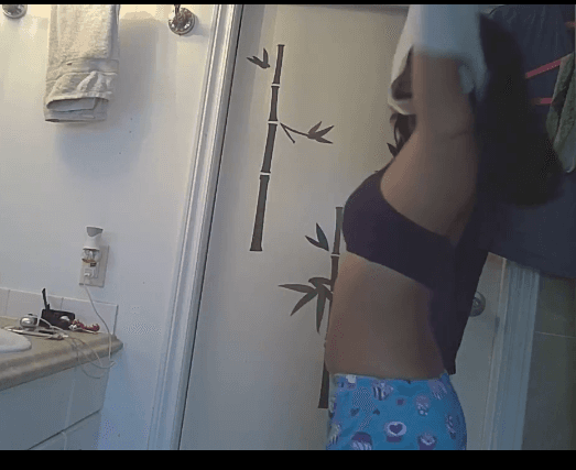 Click to view full size Asian teen on hidden cam in bathroom
