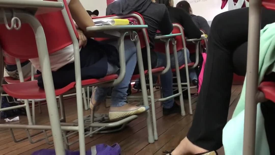 Candid dangling in class