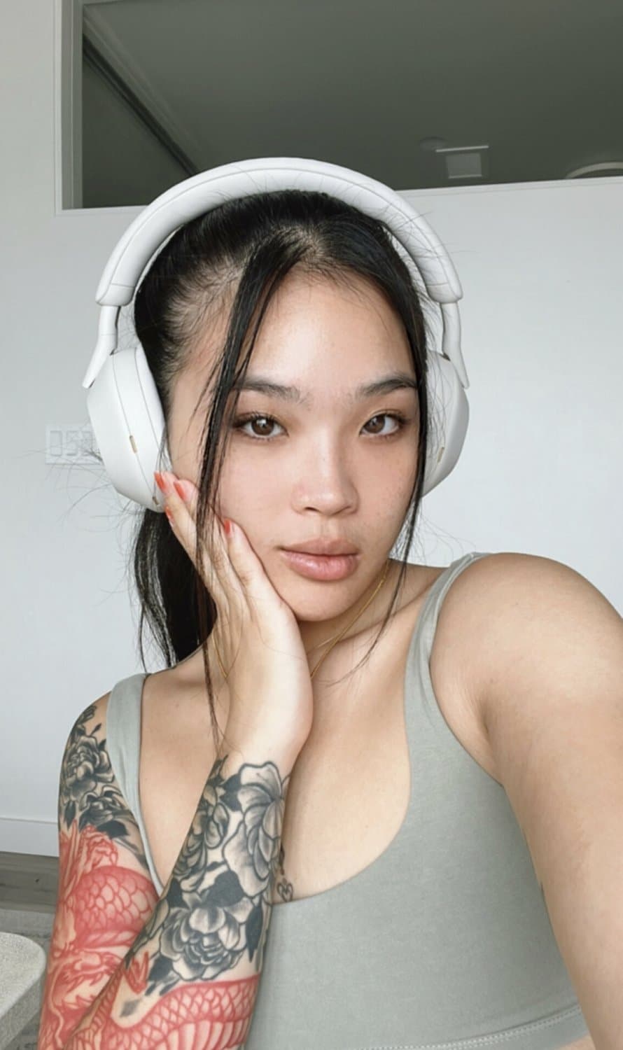 Sexy asian hottie shows off her tight body and fucks vietnamese hottie