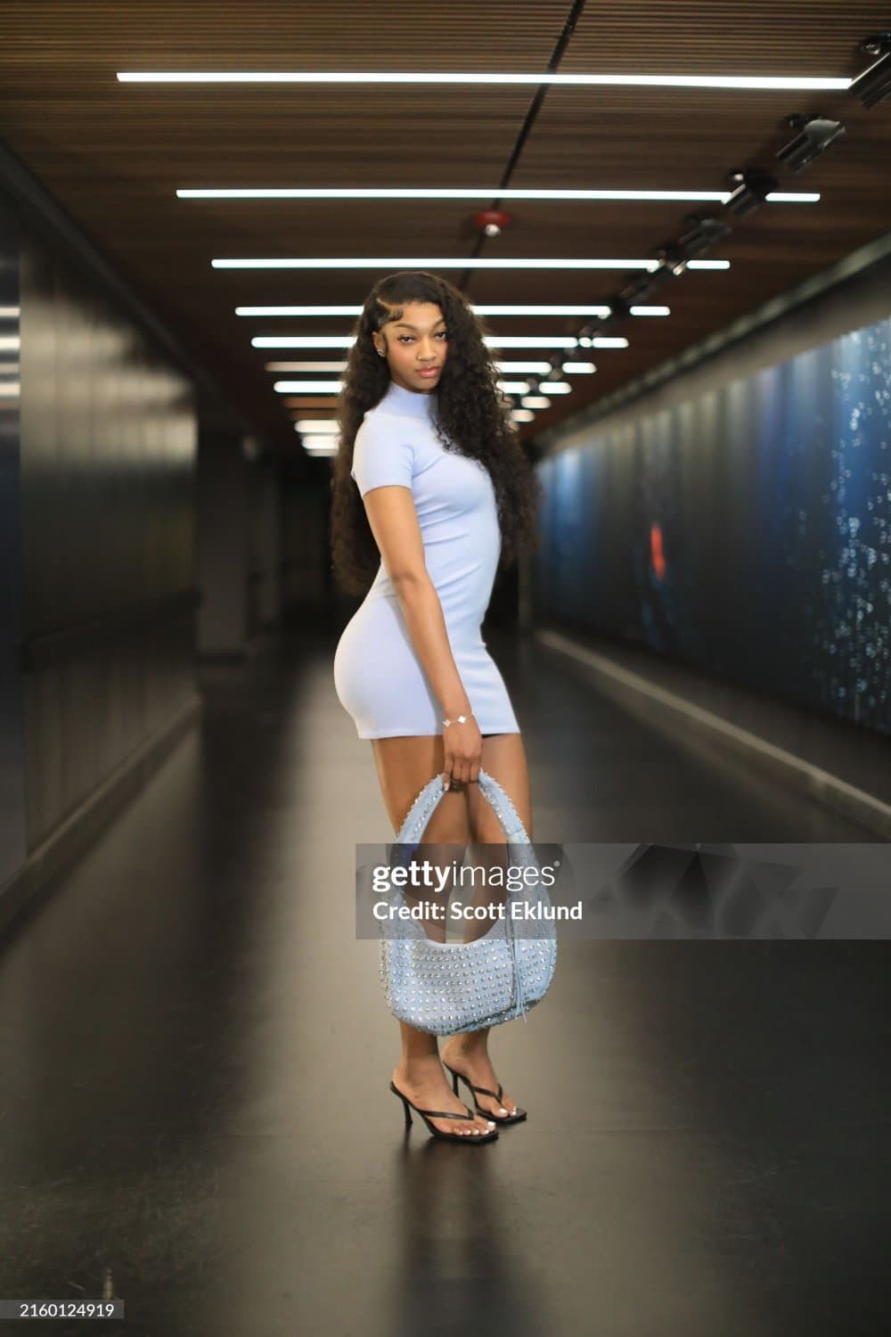 Angel Reese pretty long legs and feet