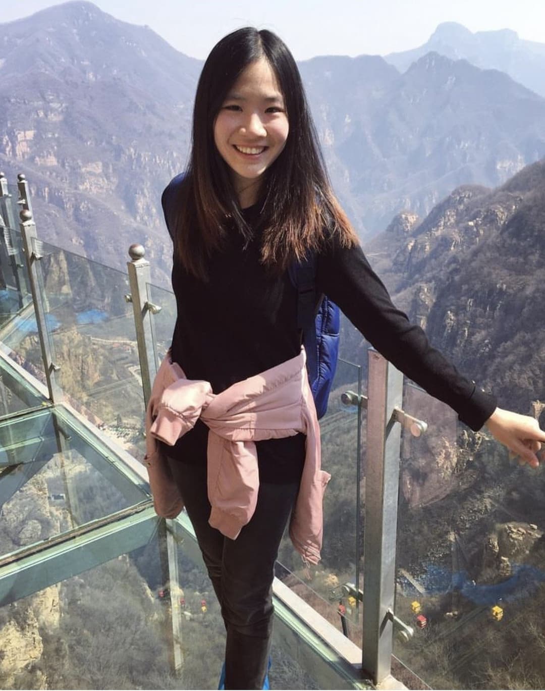 Click to view full size Cheerful Chinese cutie dry cleaning on cam