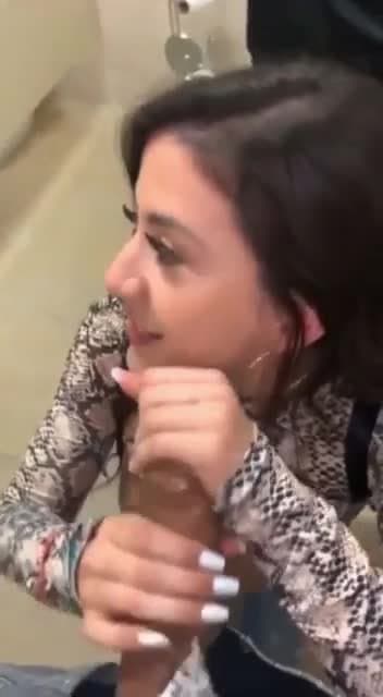 Latina mom gives head in NFL Football Stadium Restroom full of men