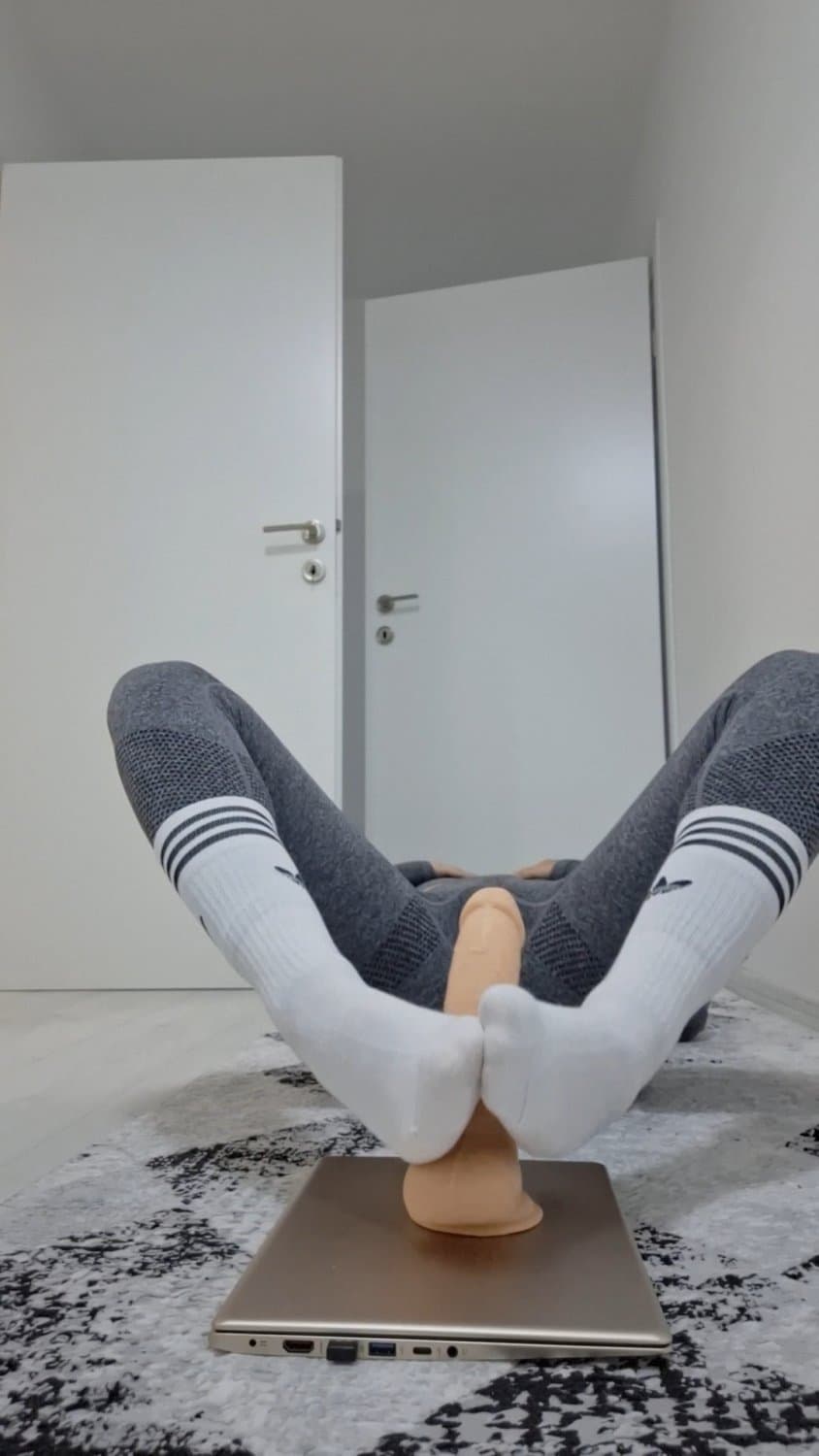 Footjob in socks and leggings