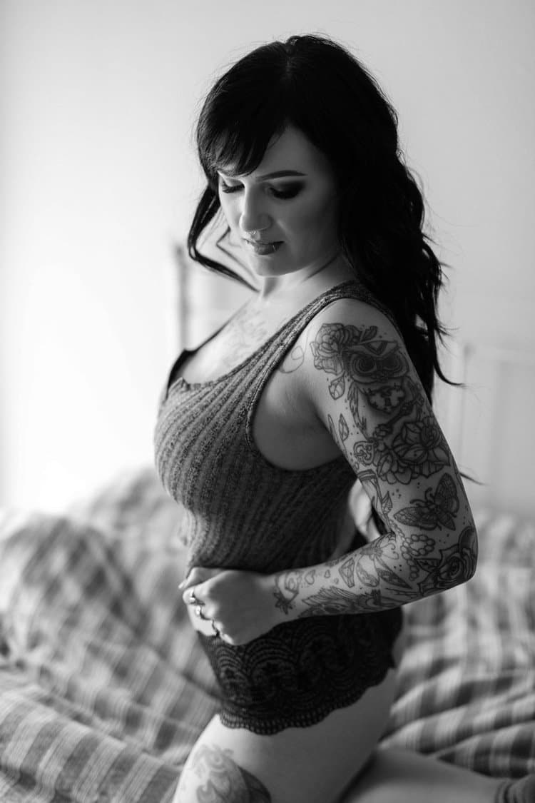 Tatted busty black hair beauty boudoir