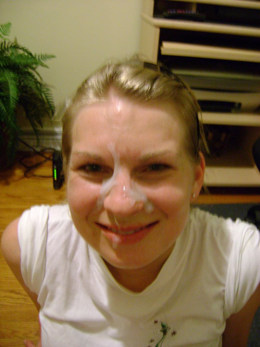 Click to view full size Cute strawberry blonde girlfriend loves big gooey cum facials