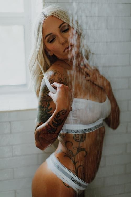 Click to view full size Intensely gorgeous blonde tatted milf boudoir