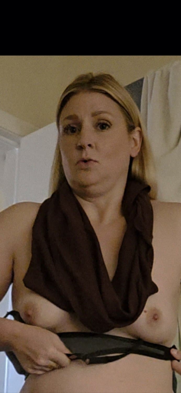 My wife Liz getting undressed and showing her nipples off