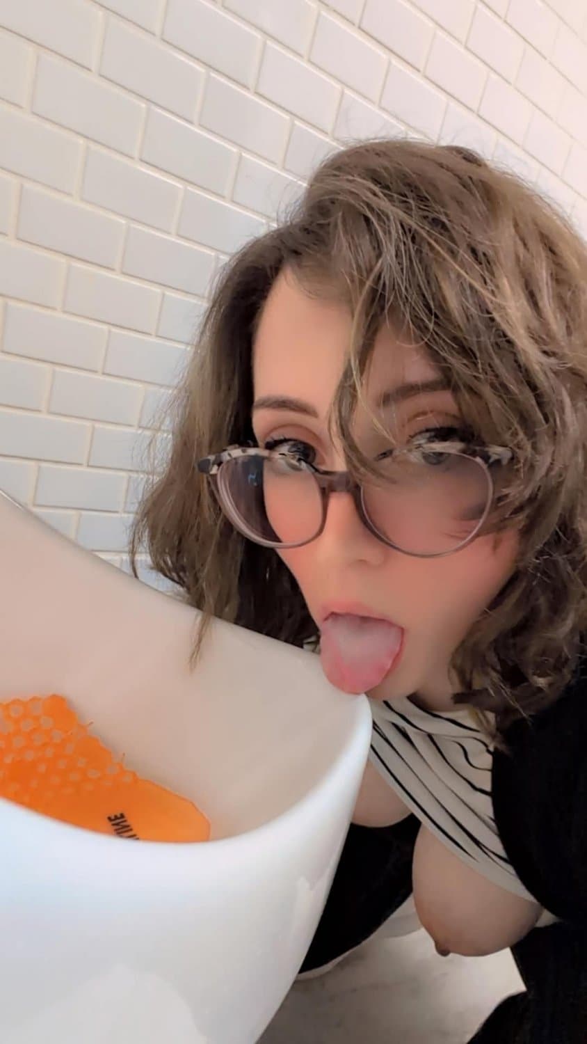 humiliated dumb slut licks urinal