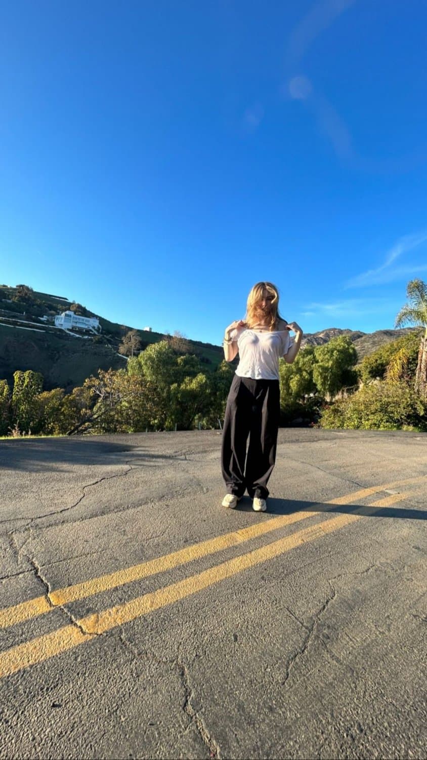 Blonde German slut with black pubes