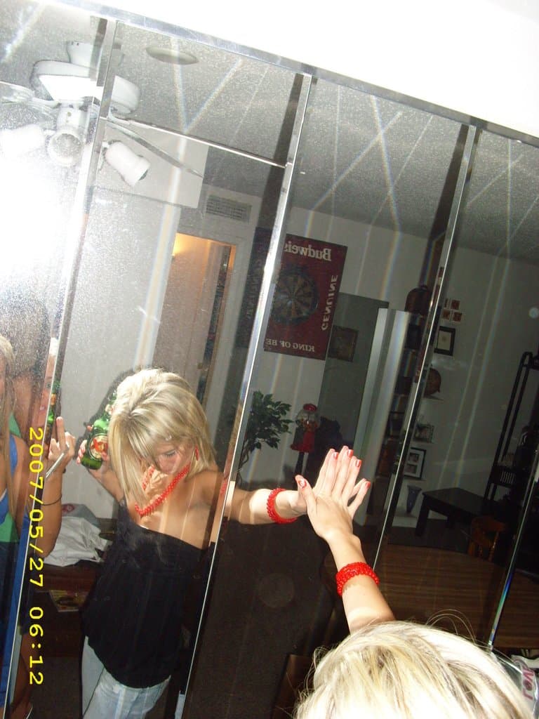 Sorority girls pre-game drink in the dorm room