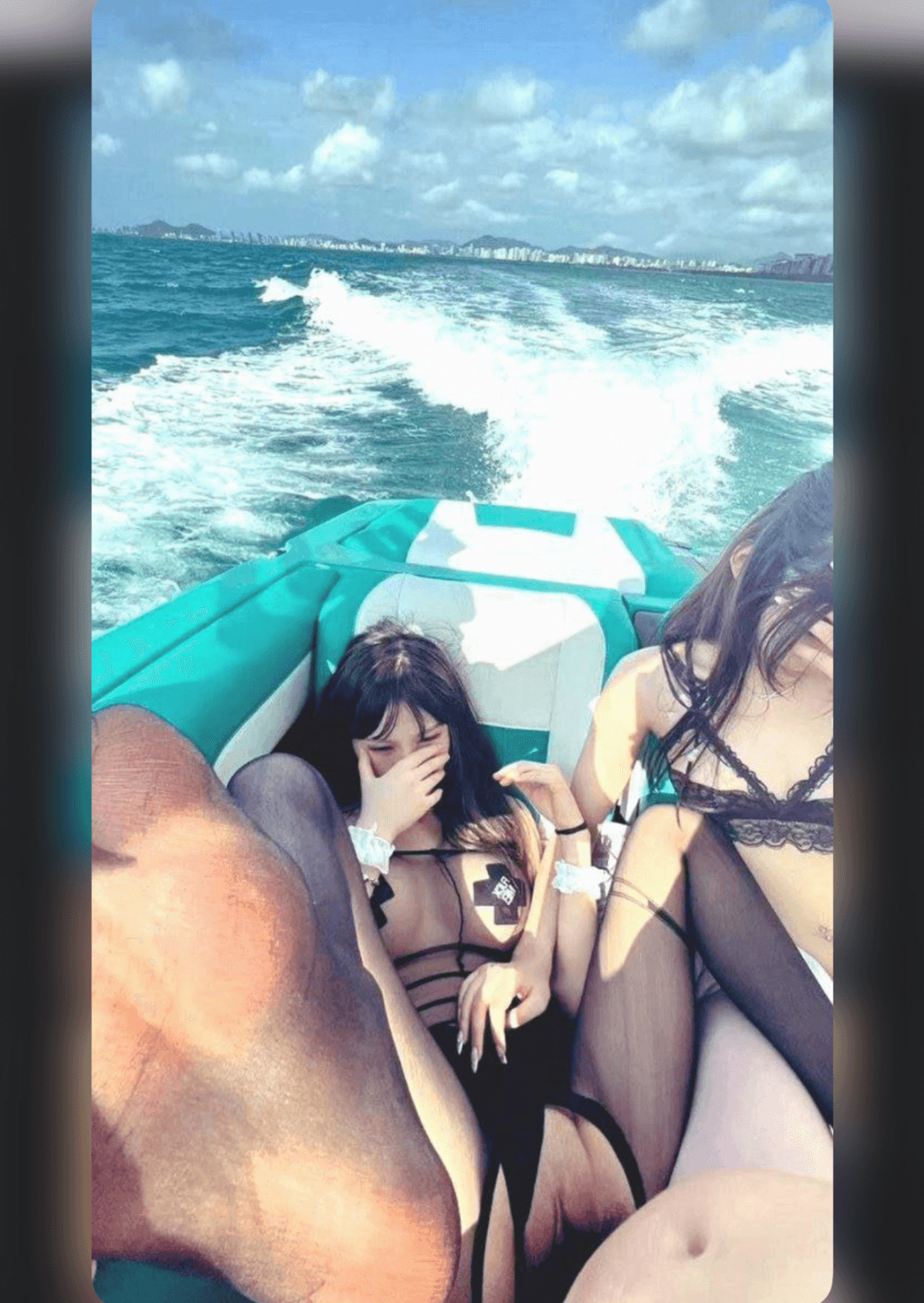 Asian babes having fun on a boat