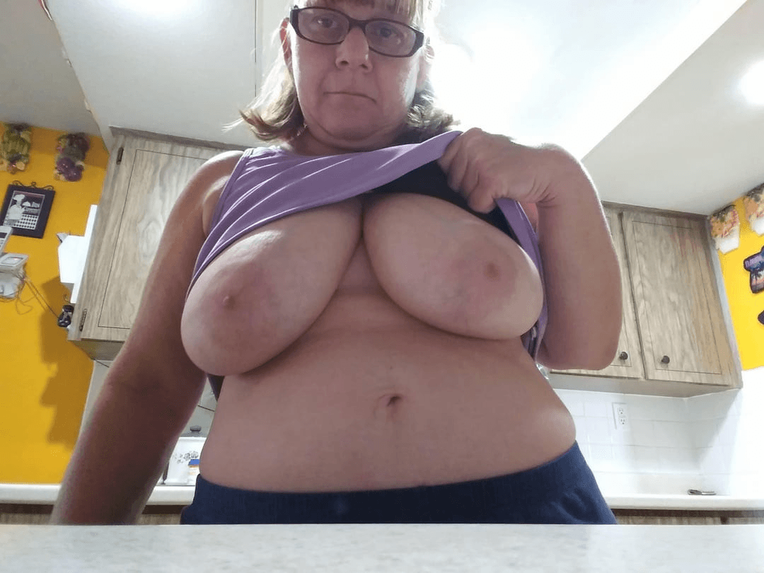 Curvy mature woman with large, beautiful, and natural breasts.
