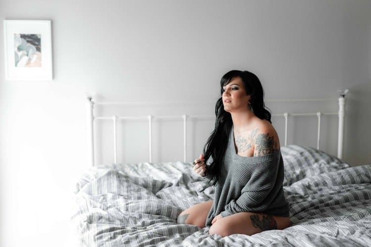 Tatted busty black hair beauty boudoir