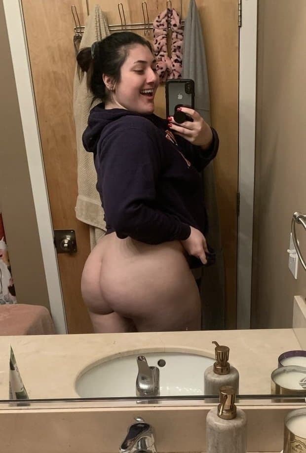 Dark haired college pawg showing off her ass to the camara