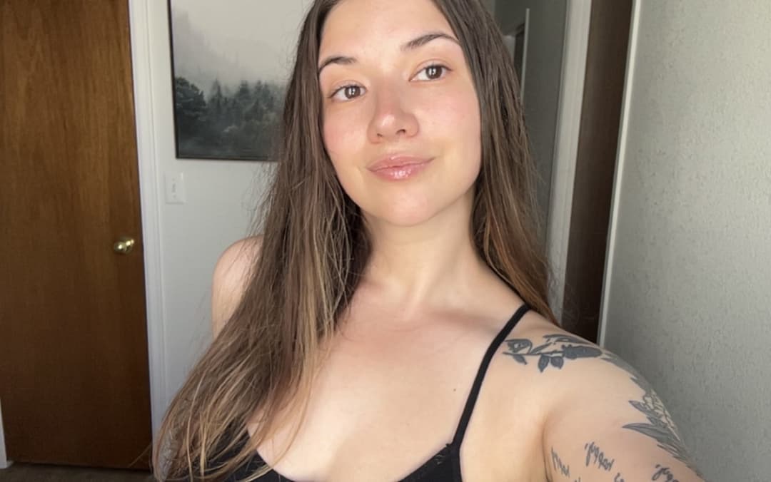 Click to view full size Hottest Milf ever? This curvy slut who loves sticking her tongue out comes damn close