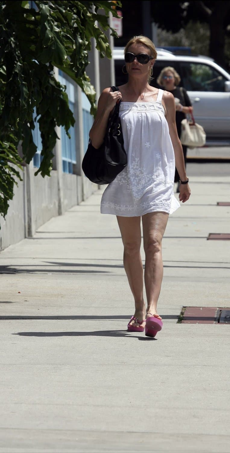 Nicollette Sheridan in platform flip flops