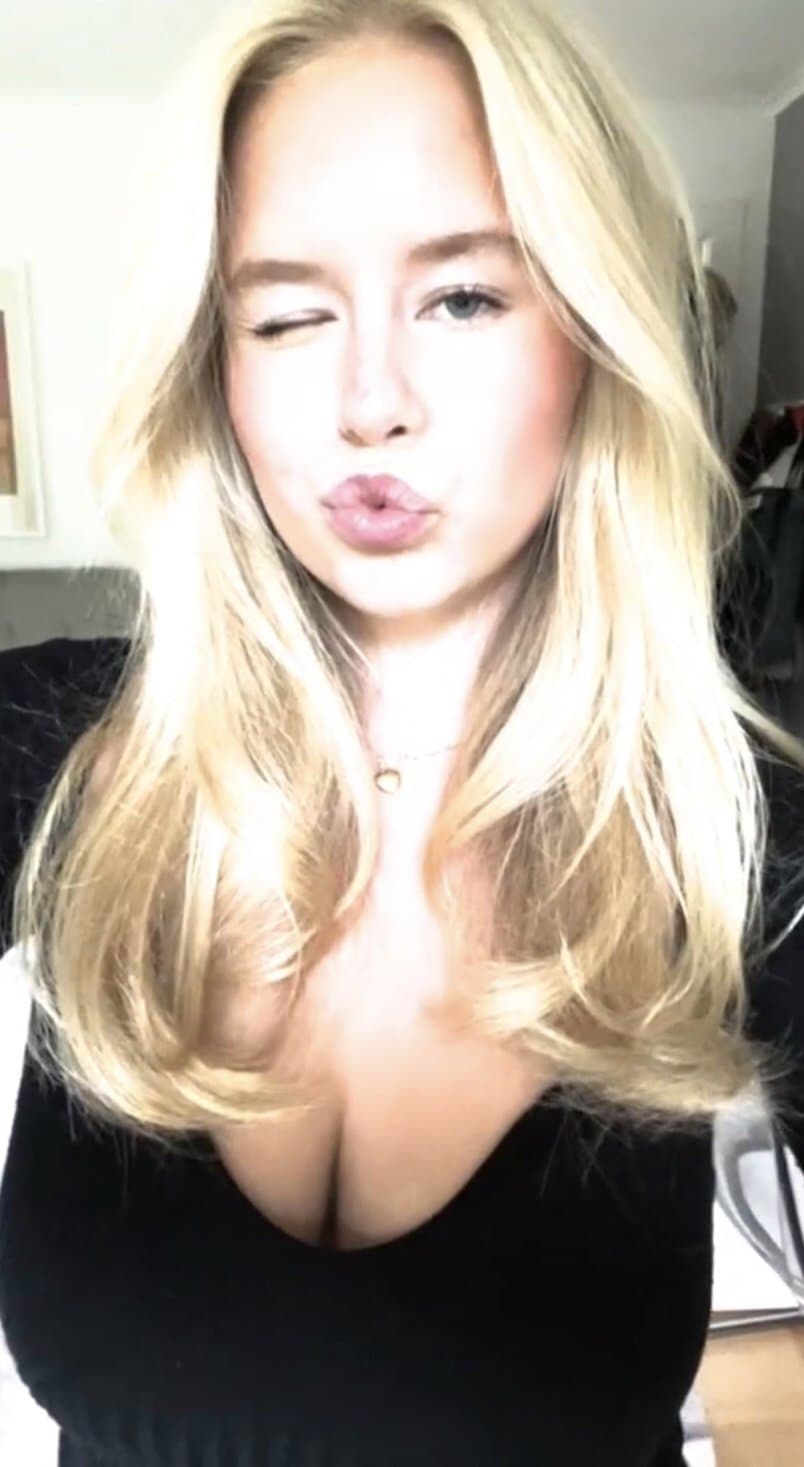 Swedish bitch Alva shows of cleavage from her massive tits