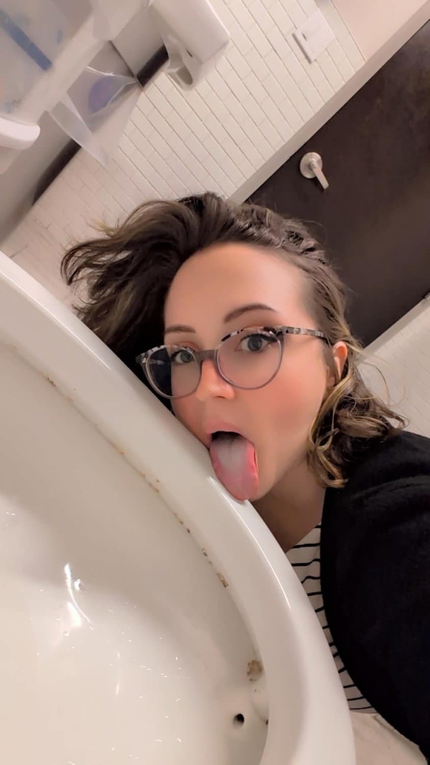 humiliated dumb slut licks urinal