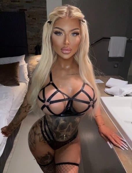 Big fake tits big fake lips German silicone bimbo long nails tongue piercing escort #13