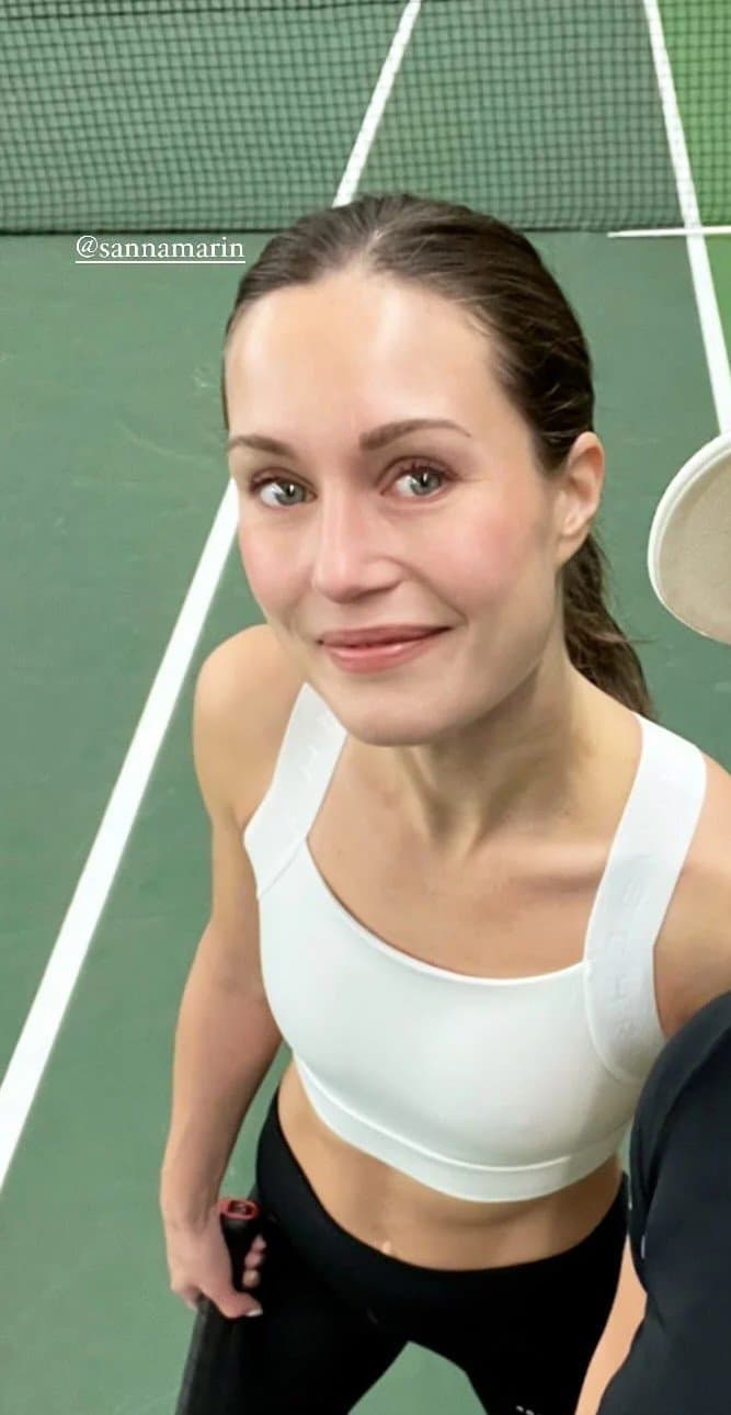 Finnish prime minister Sanna Marin.  Petite Elegant lady hinding a sex freak party chic within