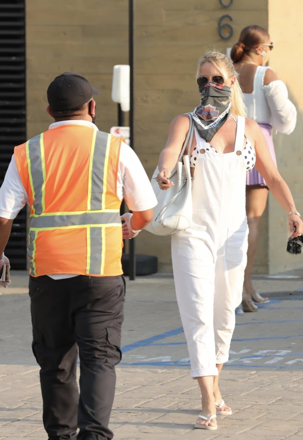 Nicollette Sheridan in platform flip flops