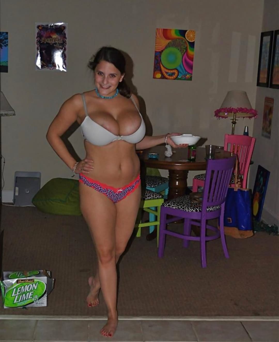 Brunette loves showing off her massive tits (non nude)