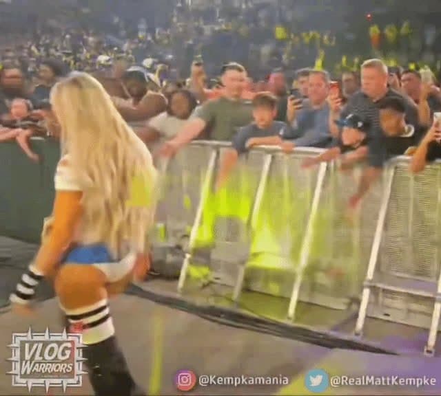 Liv Morgan in tiny plaid skirt