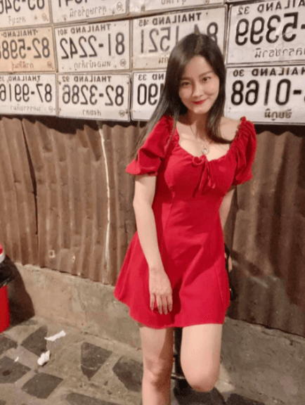 Her husband wants us to see her beautiful figure.