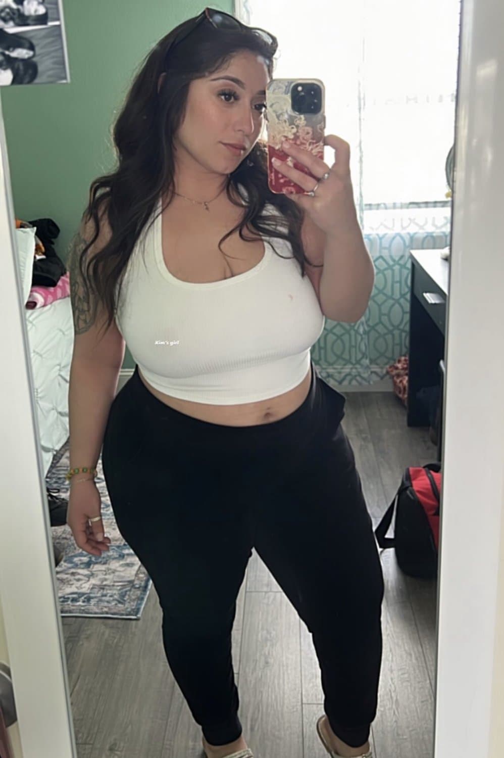 Bay Area Latina lesbian having fun with strap