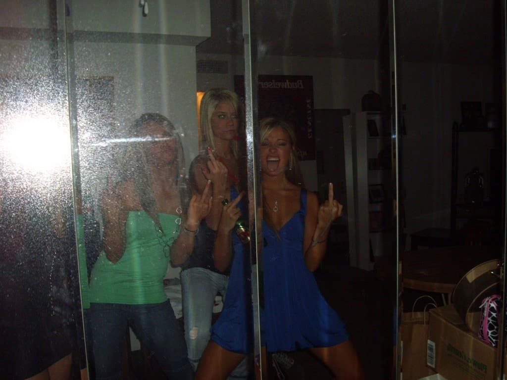 Sorority girls pre-game drink in the dorm room