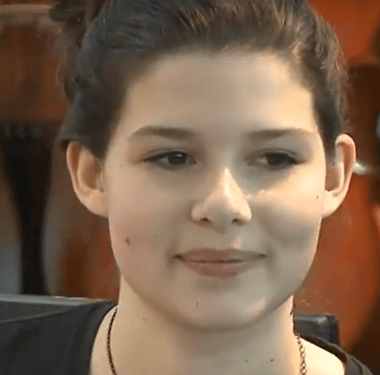 cute girl showing her mouth skills