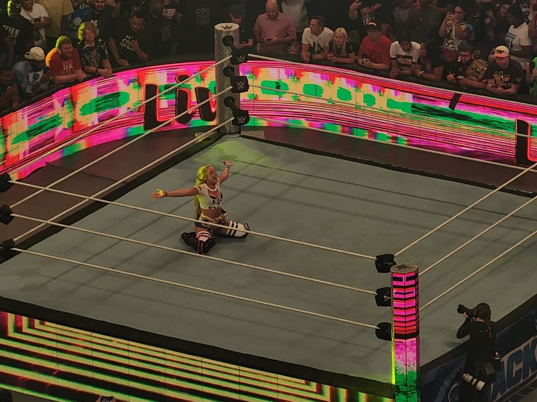 Liv Morgan in tiny plaid skirt