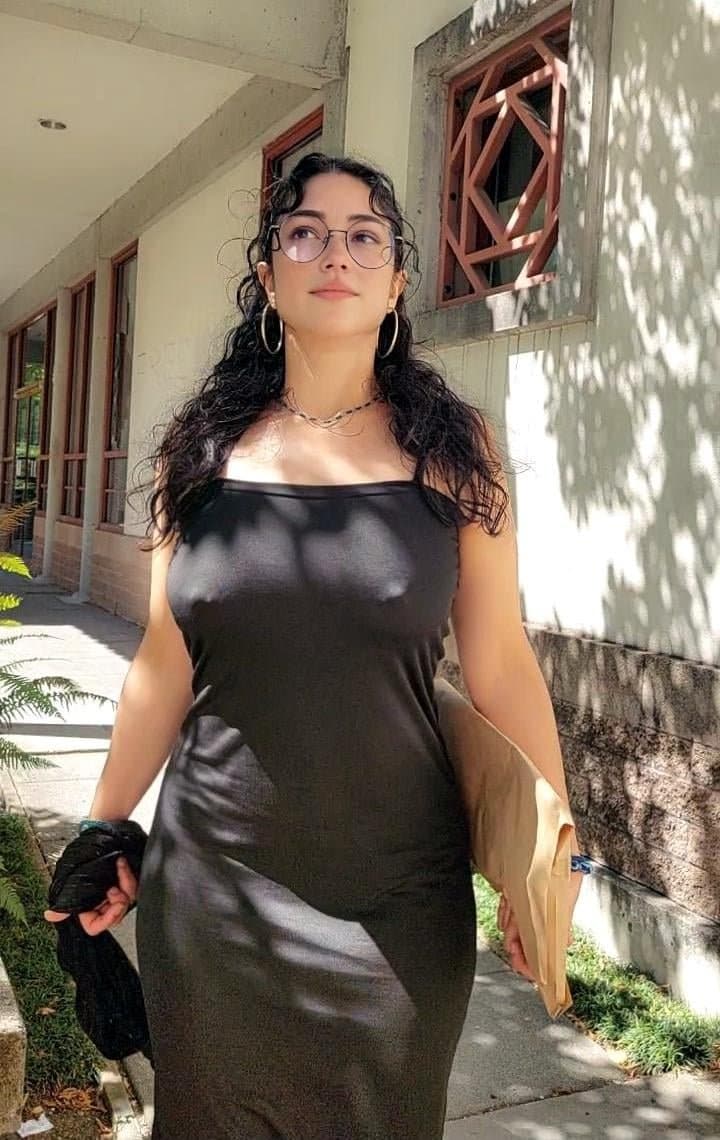 Some busty pierced braless woman ???