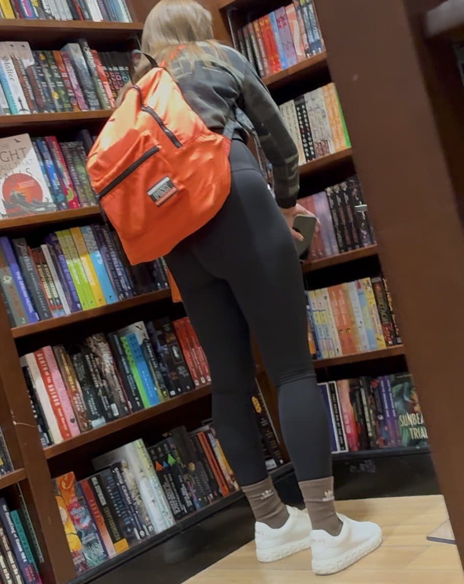 Black leggings ass looking for books
