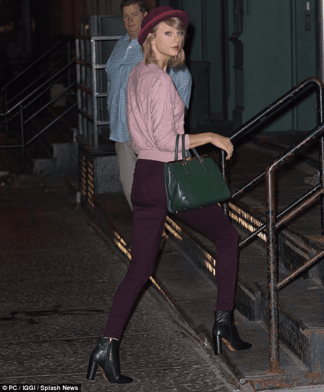 Click to view full size Taylor Swift long legs wearing ankle boots