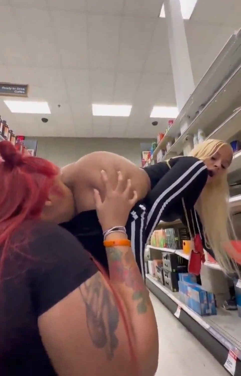 licking ass and vagina in the supermarket