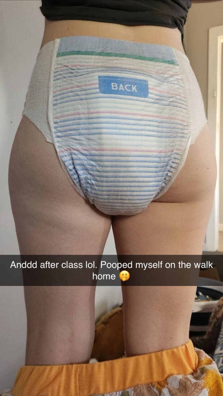 Cute tanned girl shows off her diapers and pull-ups