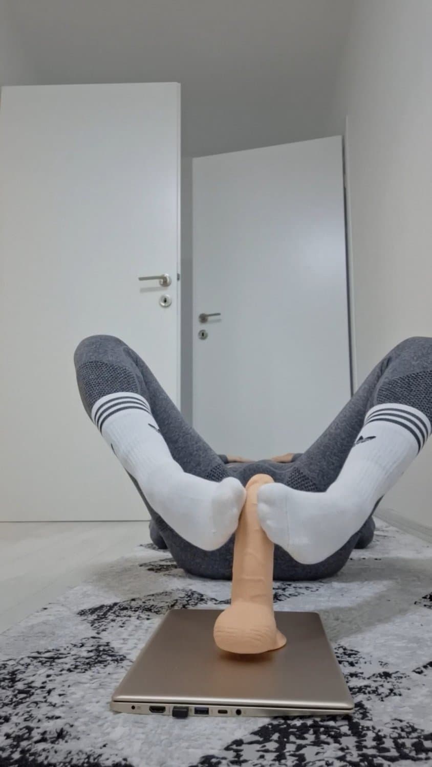 Footjob in socks and leggings
