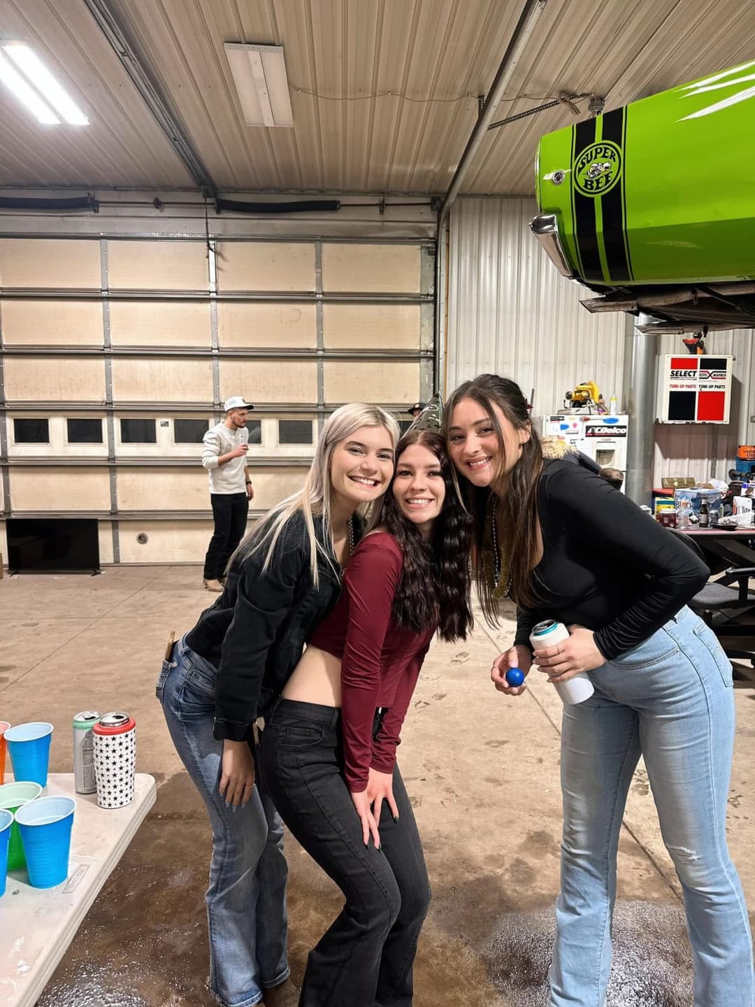 Hot Girls always go for the mean guys. Biker guy was making out with both of them as they strokedhim