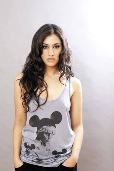 Submit to your goddess Janina Gavankar. Lose yourself in her bedroom eyes and sultry body