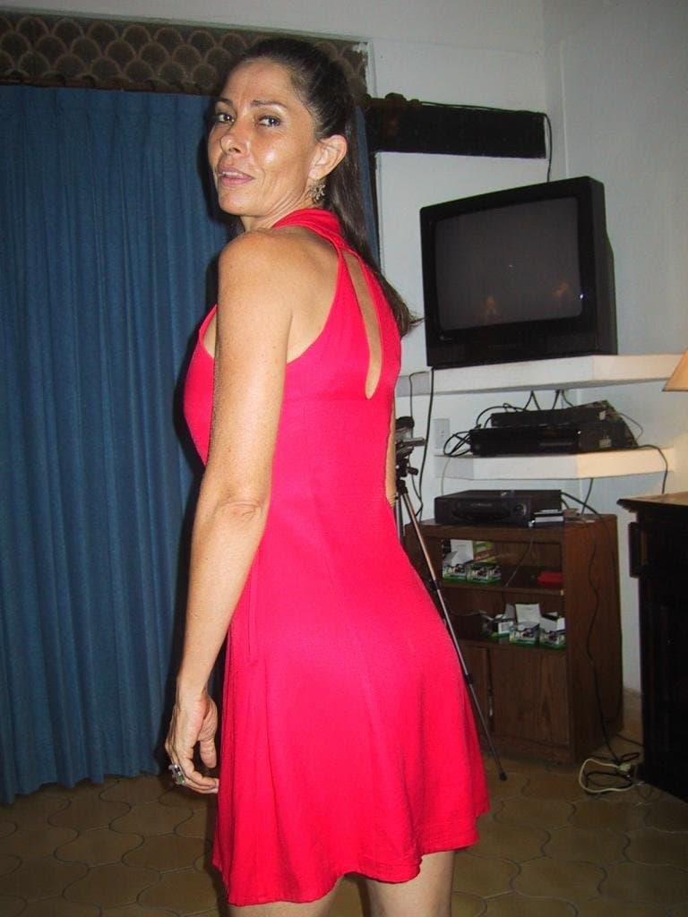 Mature Latina is shared with a younger man