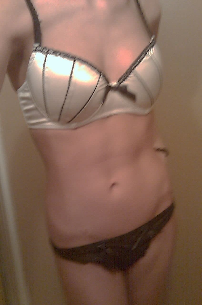 Click to view full size Naughty girl showing herself in lingeries