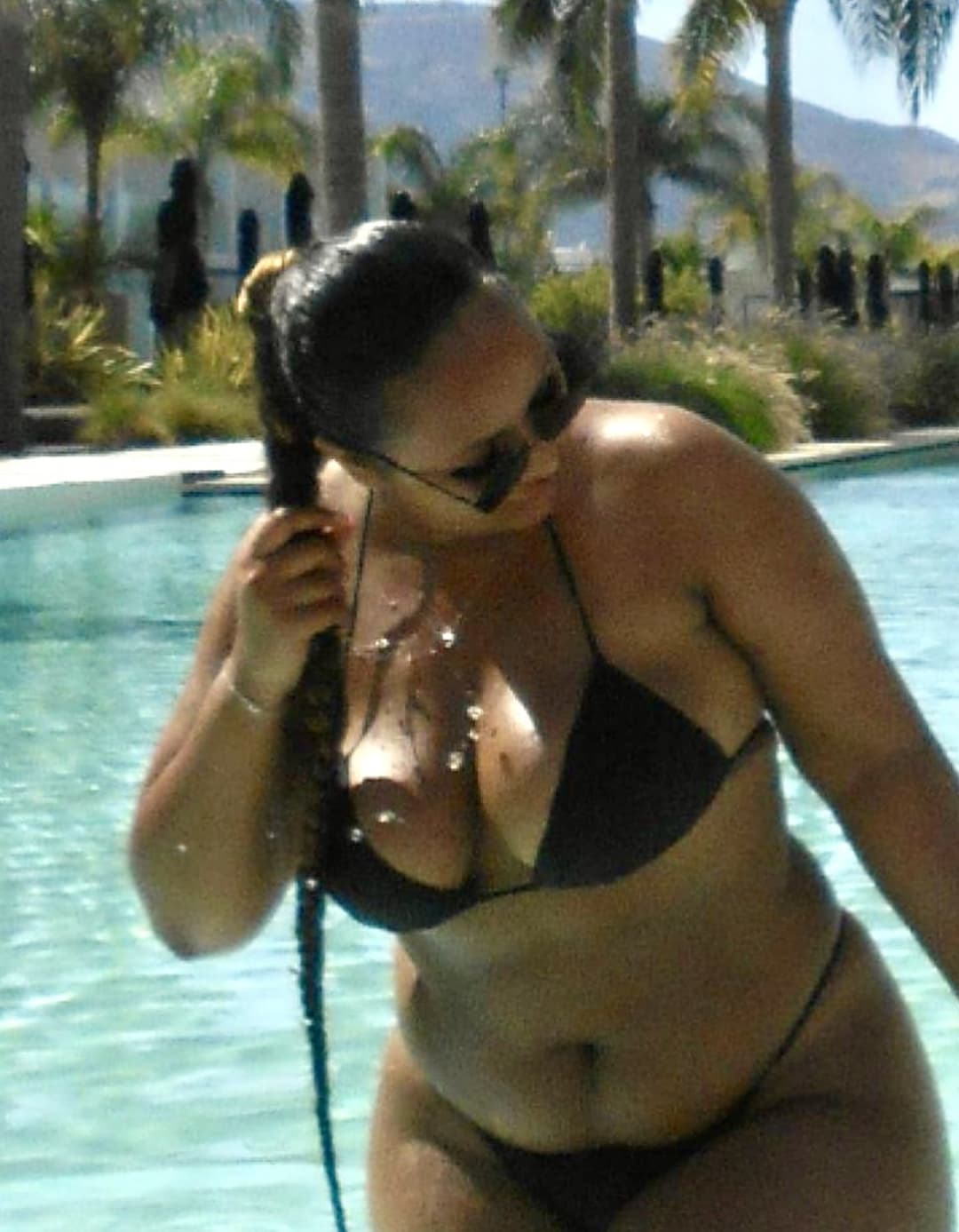 Fat busty nigga making sure her nipple is always slipping & her fat black ass is showing. Fat fuck